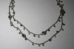 lot 248 image: Signed Anne Taylor Loft 2-strand silver tone necklace with blue and white glass stations. Has Loft hang tag. Lobster clasp. 30L