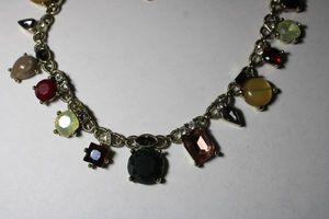 lot 250 image: Signed Anne Taylor Loft textured link chain necklace with multi colored prong set glass stations. Has Loft hang tag. Spring ring clasp. 16L with 2 extender.