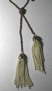 lot 251 image: Signed Anne Taylor Loft antiqued rope chain lariat style necklace with faux seed pearl tassel end caps. Has Loft hang tag. Lobster clasp. 30L