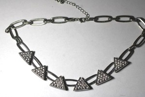 lot 254 image: Geometric silver tone paper clip chain necklace with crystal triangle stations. Lobster clasp. 14L with 2 extender.