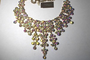 lot 258 image: Signed Natasha faceted crystal rhinestone bib style statement worthy necklace with retail tag. Has Natasha hang tag. 18L.