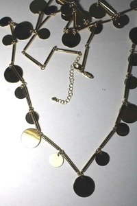 lot 260 image: Signed gold plated disc station necklace. Has Natasha hang tag. Lobster clasp. 44L with 2 extender