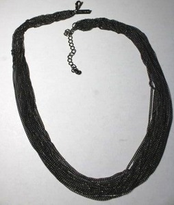 lot 266 image: Signed Daisy Fuentes multi chain necklace., Has Daisy Fuentes hang tag. Lobster clasp. 20L