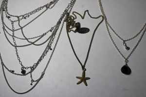 lot 271 image: (3) Signed Mark (Avon, discontinued) necklaces. All have Mark hang tag. One has starfish pendant.