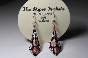 lot 275 image: Signed Paper Fuchsia silver filled earrings with Yuzen Japanese paper origami ear wire earrings. On retail card.