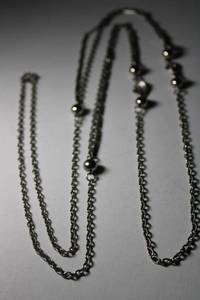 lot 278 image: Signed Park Lane silver tone opera length necklace. Has Park Lane hang tag. 52L
