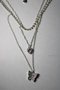 lot 285 image: Signed Roman rhinestone butterfly and heart dangle layered necklace. Has RU hang tag which is later 1990s Roman tag. Lobster clasp. 14L