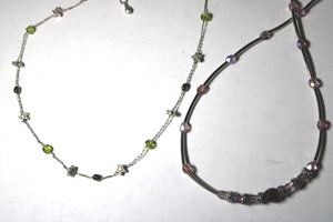 lot 288 image: Signed Lady Remington (Lia Sophia) 1986 crystal station necklace. Has LR hang tag. 14L. Also includes a silver plate star station necklace with LR hang tag. 14L with 3 extender.