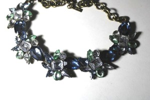 lot 292 image: Signed SugarFix blue and clear prong set teardrop rhinestone collar necklace. Has SugarFix hang tag. 14L