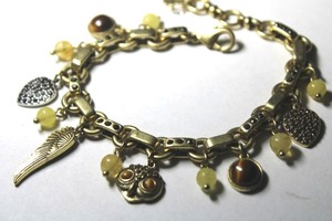 lot 293 image: Signed Lucky brand adjustable charm bracelet with Tigers Eye beads, pave heart and owl with Tigers Eye eyes. Has Lucky hang tag. Adjustable 7.5-8.5L