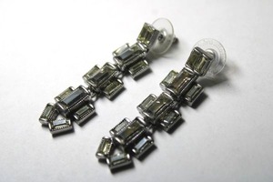 lot 298 image: Signed Stella  Dot articulated bezel set baguette poststud earrings. Marked Stella  Dot on back. 2L