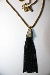 lot 309 image: Signed Vince Camuto black chain tassel necklace with pave crystal connector on 30L flexible gold plated necklace. Has Vince Camuto hang tag. Well made piece. Oversize lobster clasp.