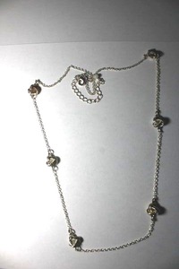 lot 319 image: Signed NWT (Avon, late 1990s-early 2000s) blue crystal station statement necklace. Marked NWT. 24L with 3 extender