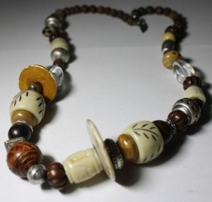 lot 323 image: Signed Coldwater Creek mixed material acrylic and wood baublelarge bead chunky statement necklace. Has Coldwater Creek hang tag. 24L
