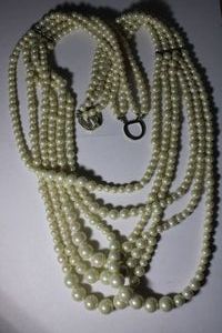 lot 327 image: Signed Chicos massive 6-strand pearl statement necklace with crystal covered hook clasp and separator bars. Has Chicos hang tag. Drop is 32L