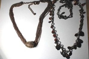 lot 329 image: (2) Signed Chicos copper colored necklaces. Both have Chicos hang tag. 16 and 34L
