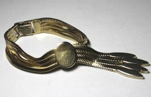 lot 334 image: Signed Monet serpentine slide modernist bracelet designed by Edmund Granville 1940s. Marked Monet on clasp. Pull chain slides work well.