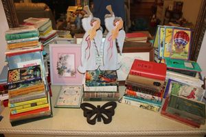 lot 134 image: Books and wall decor Readers Digests, Nancy Drew, Seminary books and more