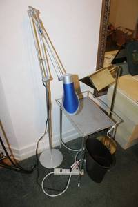 lot 131 image: Adjustable floor lamps and small metal table