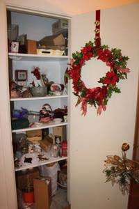 lot 138 image: Christmas wreathes and closet contents, see photos