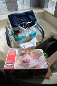 lot 198 image: Shower chair, toilet seat, vaporizer, heating pad and more