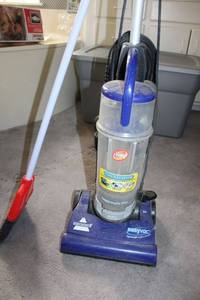 lot 186 image: Bissell lightweight bagless vacuum and broom
