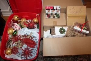 lot 201 image: Christmas ornaments and decorations (red tote and box)