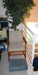 lot 205 image: Rolling armchair, Artificial Ficus tree and rolling foot stool