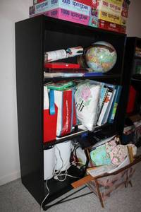 lot 213 image: Black bookshelf (not contents)