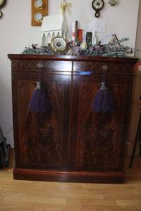 lot 10 image: Vintage Cabinet - 36x22.5x39. Features 4 drawers inside. Contents sold in separate lot.