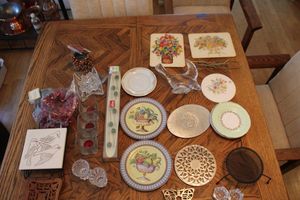 lot 38 image: Dining table decorations, trivets, crystal toothpick holders, flamingo glasses, Christmas glasses and more