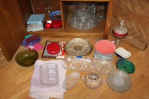lot 44 image: Generous assortment of serving dishes including cranberry lidded  compote and clear punchbowl  set.