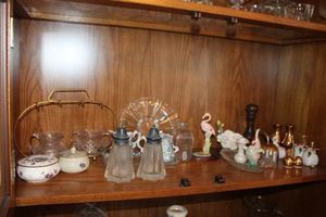 lot 42 image: Cream and Sugar sets, and salt and pepper shakers.