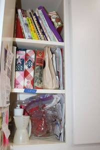lot 59 image: Recipe books and Pyrex measuring cups
