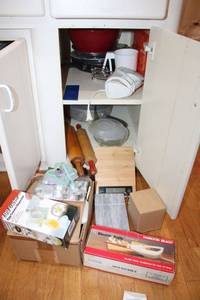 lot 63 image: Kitchen electric knife, egg cutter, cookie cutters, rolling pins, marble cheese board, hand mixer and more.