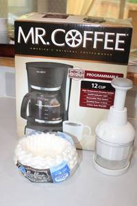 lot 68 image: Mr. Coffee coffee maker, filters and food chopper.