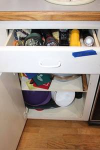 lot 75 image: Flashlights, battery tester, Brita water pitcher, and mixing bowls