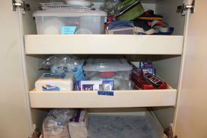 lot 80 image: Plastic disposable cups, napkins, lunch bag coolers