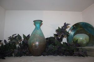 lot 98 image: Pottery and artificial plant