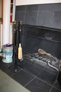 lot 106 image: Fireplace screen, fireplace tool set, and dairy pail lighters