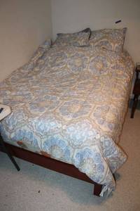 lot 258 image: Full size bed frame and bedding as shown