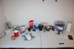 lot 259 image: Office desk supplies includes brother label maker, and Wi-Fi router