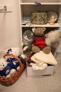 lot 267 image: Quilting fabrics, Plush animals, sewing kit and vintage pin cushion girl
