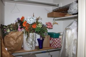 lot 228 image: Craft flowers, fabrics, poly-fil, sewing patterns and dress