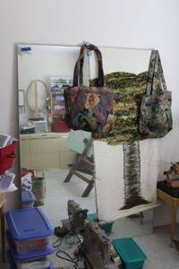 lot 235 image: Large unframed mirror, tapestry tote bags, and latch stitched tree