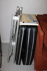 lot 244 image: Air mattress and aluminum cot with folding cushion