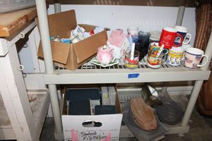 lot 283 image: Coffee mugs, Garfield mugs, ceramic tea house and flower sugar bowl, votive candles, aluminum plates, hymnals
