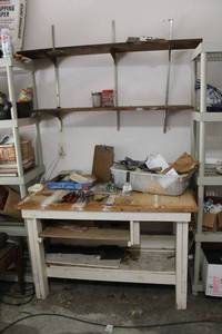 lot 284 image: Work table and wall shelves with contents as shown (bring tools to remove)