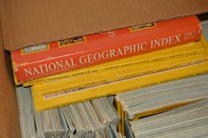 lot 235 image: Readers Digest and National Geographic magazines from the 1970s-1980s. (2 boxes)