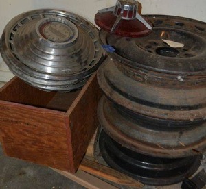 lot 228 image: Vintage Ford hubcaps and wheels